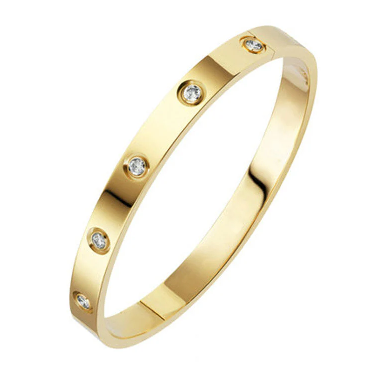 LYXARMBAND MED ZIRKONIER | GULD